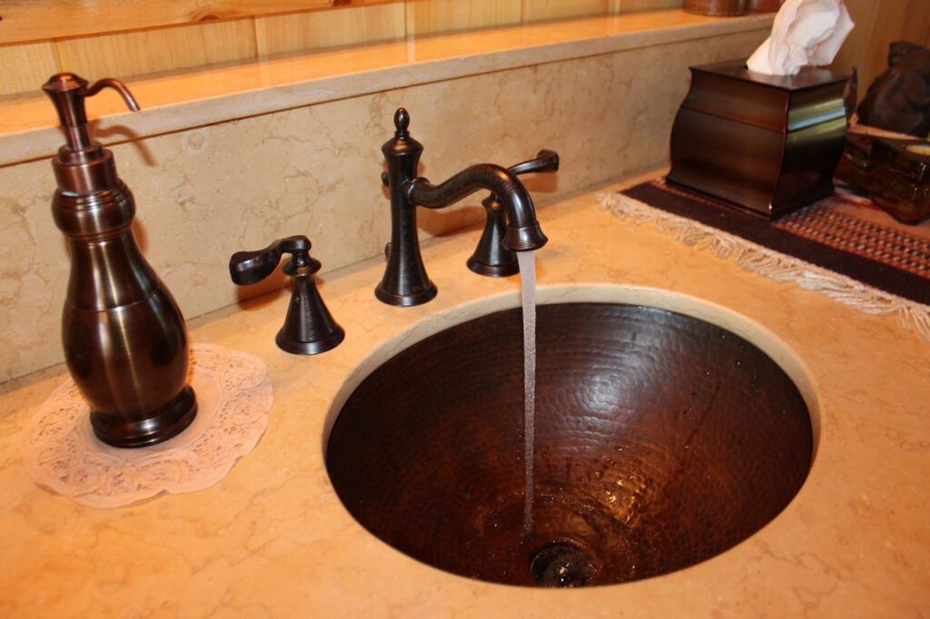 Under mount copper bathroom sinks.